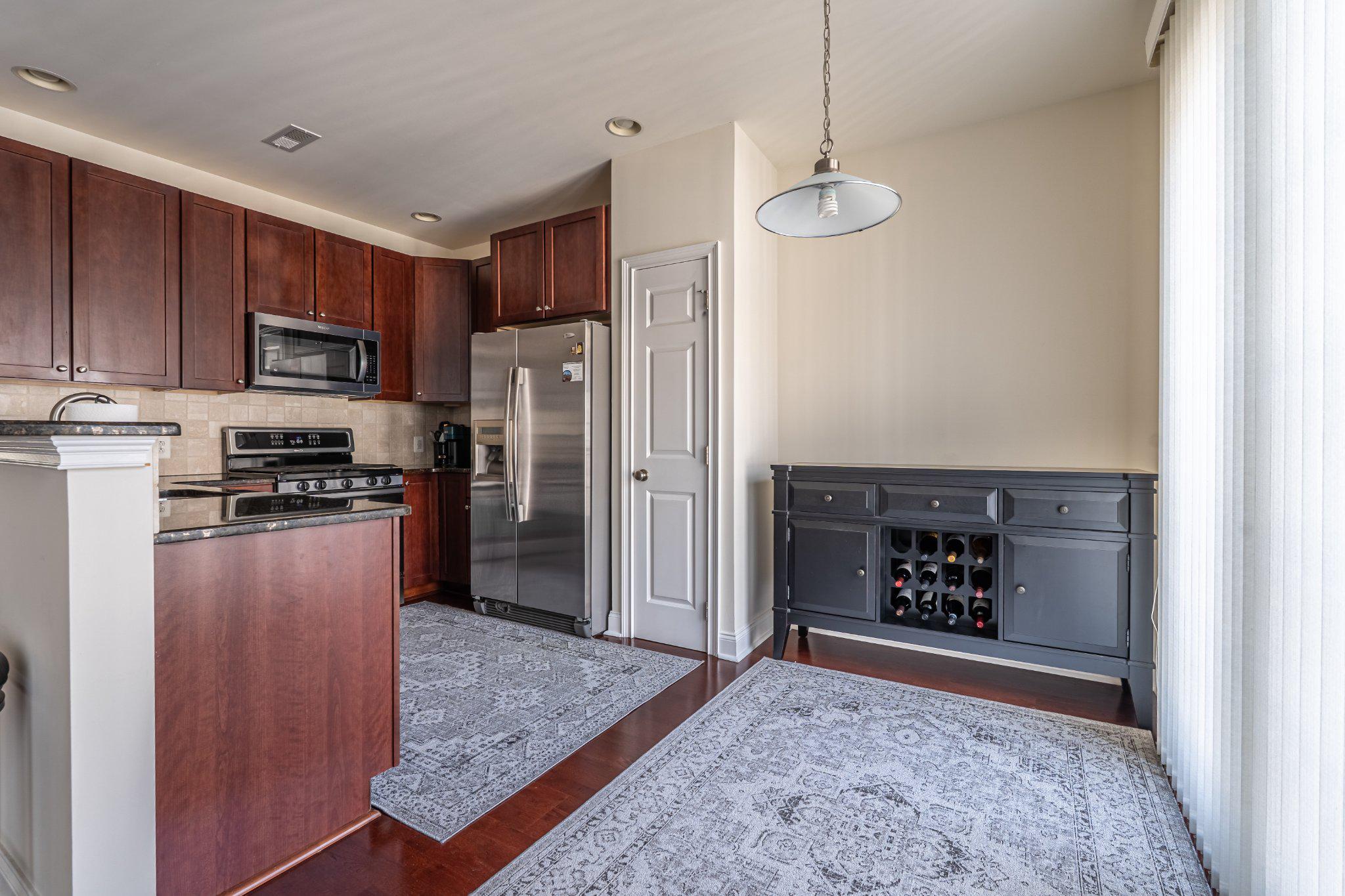 608 Captains Way Philadelphia, PA 19146 - Photo 14 of 36 a kitchen with stainless steel appliances granite countertop a refrigerator a oven a sink and dishwasher