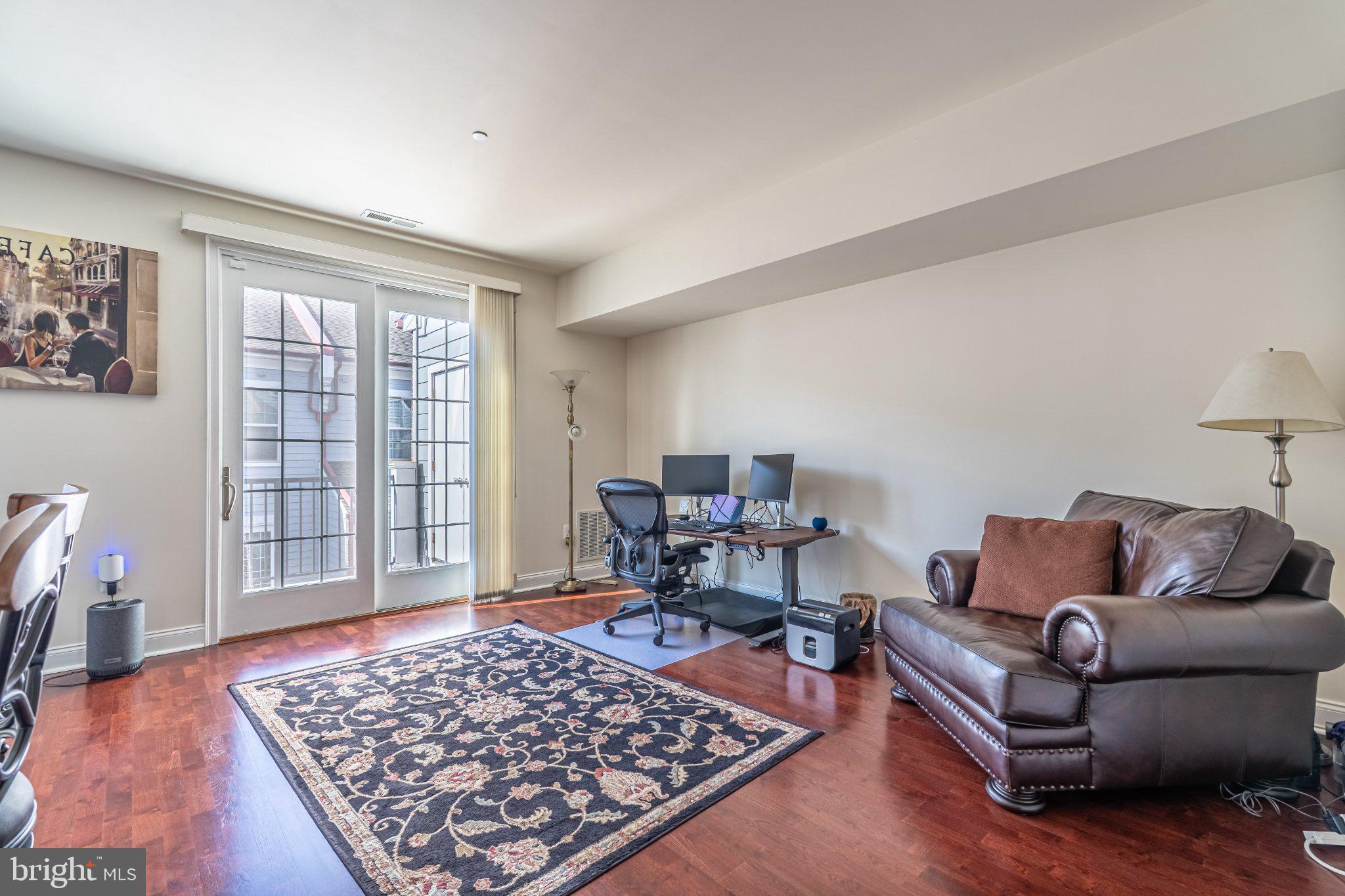 608 Captains Way Philadelphia, PA 19146 - Photo 17 of 36 a living room with furniture rug and window
