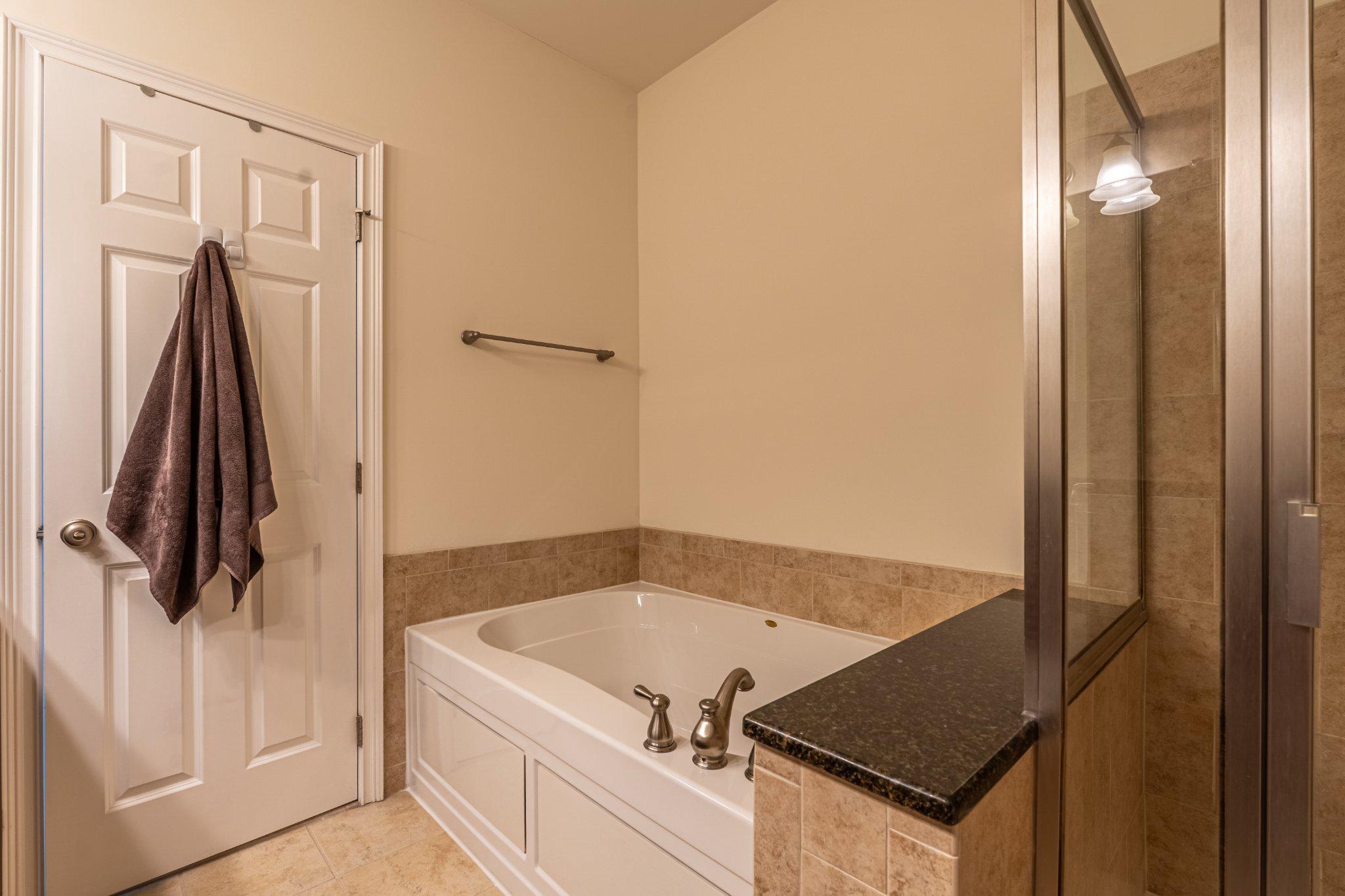 608 Captains Way Philadelphia, PA 19146 - Photo 24 of 36 a bathroom with a tub and a shower