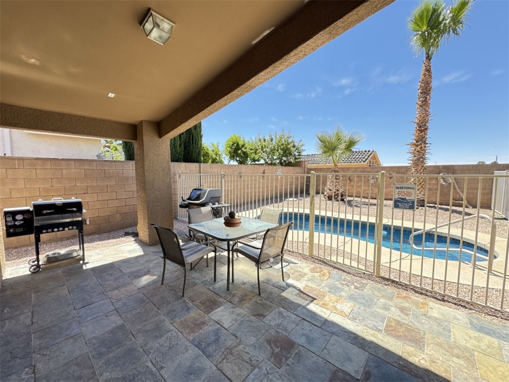 3316 Producers Mine Road Kingman, AZ 86401 - Photo 13 of 35 Covered patio featuring an outdoor ceiling light and recessed lighting