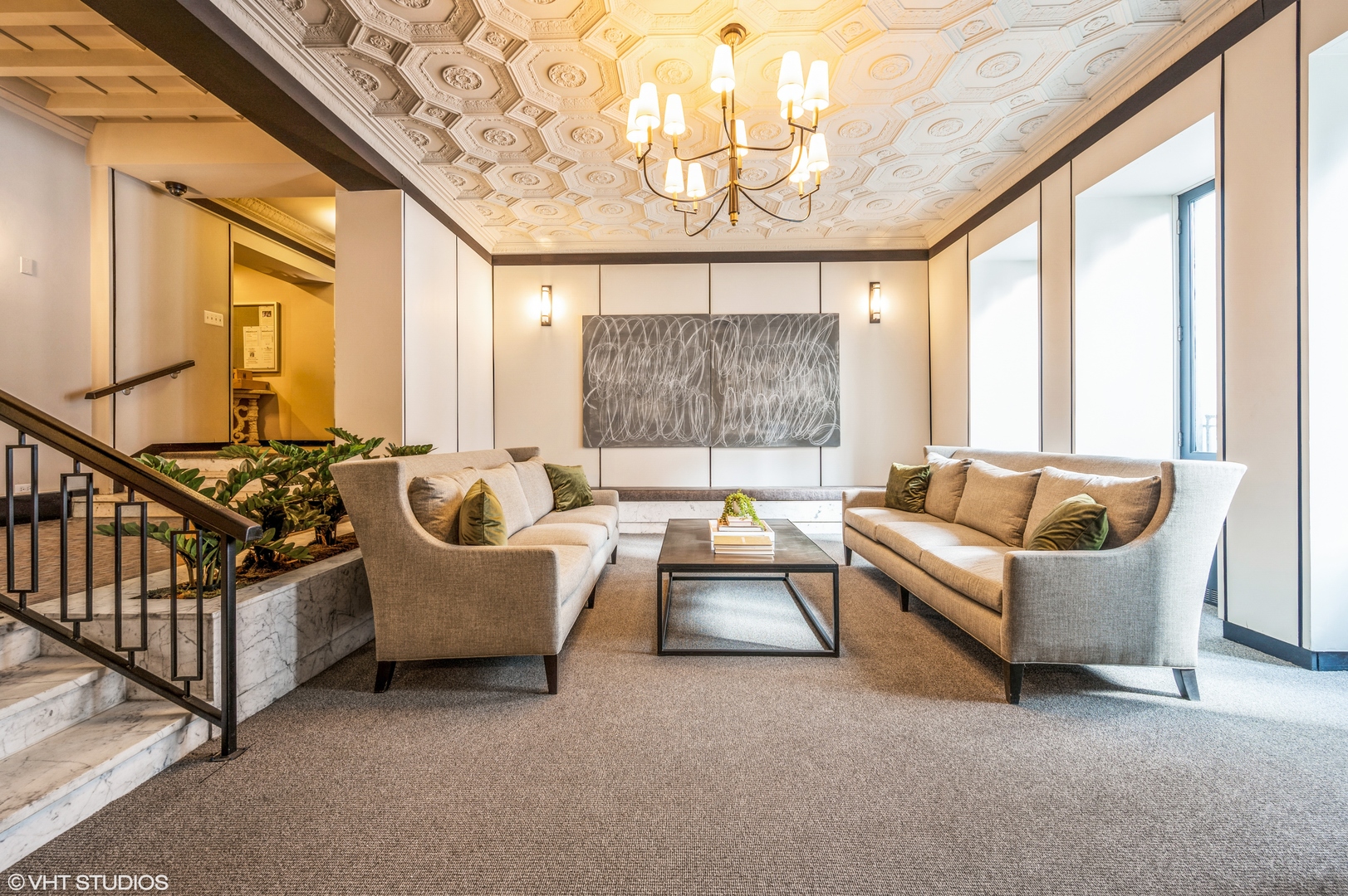 6101 North Sheridan Road, Unit 10G Chicago, IL 60660 - Photo 2 of 10 a living room with furniture and a large window