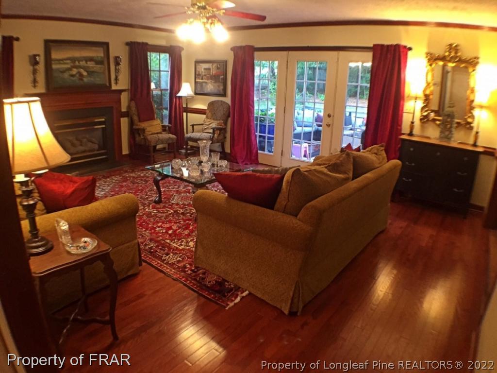 6250 Kirkwall Road Fayetteville, NC 28311 - Photo 3 of 16 a living room with furniture and a large window