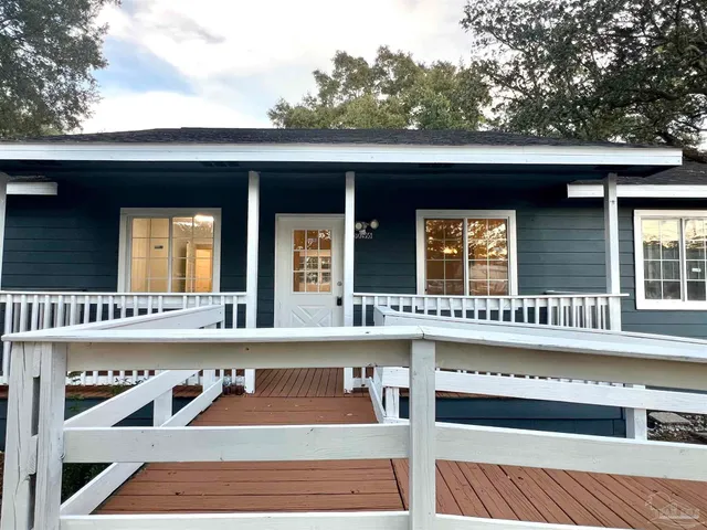 a view of swimming pool with outdoor seating