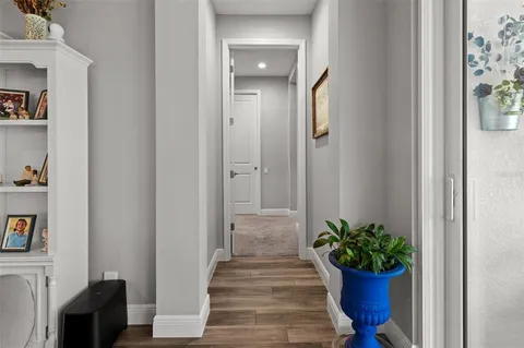 a bedroom with a bed and a view of bedroom