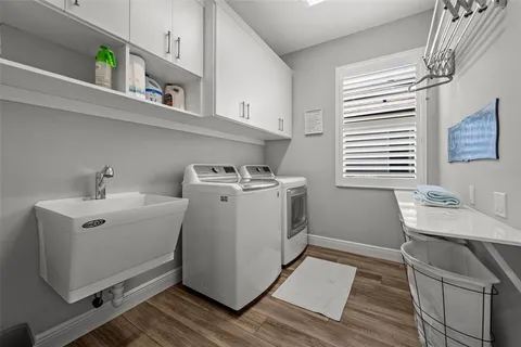 a view of a dining table and chairs in the patio