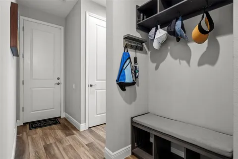 a view of a backyard with sitting area and garden