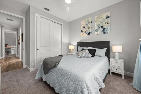 an aerial view of a house with yard and ocean view