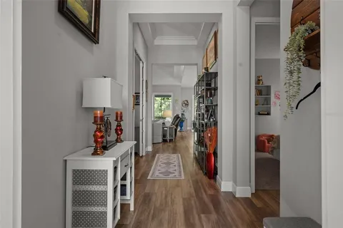 a view of a room with a ceiling fan