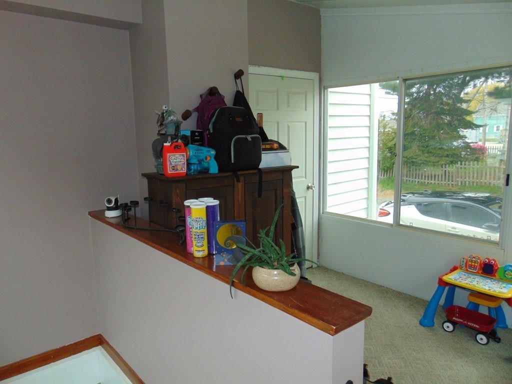 312 Anthony Fall River Fall River, MA 02721 - Photo 11 of 19 a room with toys and a potted plant