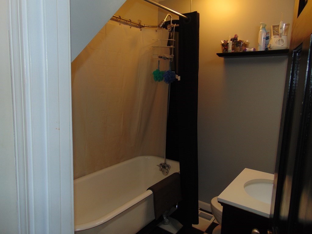 312 Anthony Fall River Fall River, MA 02721 - Photo 15 of 19 a bathroom with a bathtub and a sink