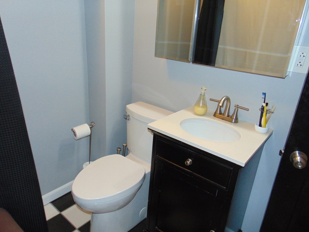 312 Anthony Fall River Fall River, MA 02721 - Photo 16 of 19 a bathroom with a sink and a toilet