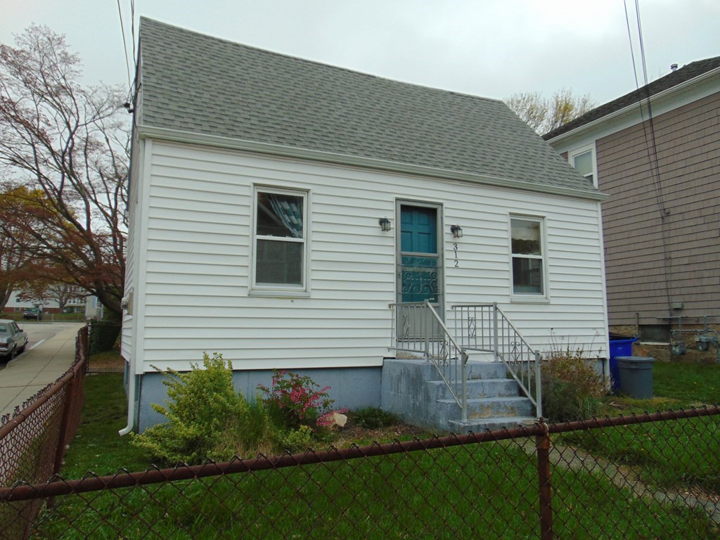 312 Anthony Fall River Fall River, MA 02721 - Photo 2 of 19 a view of a house with backyard and a garden