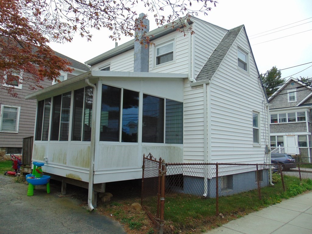 312 Anthony Fall River Fall River, MA 02721 - Photo 5 of 19 a front view of a house with a balcony