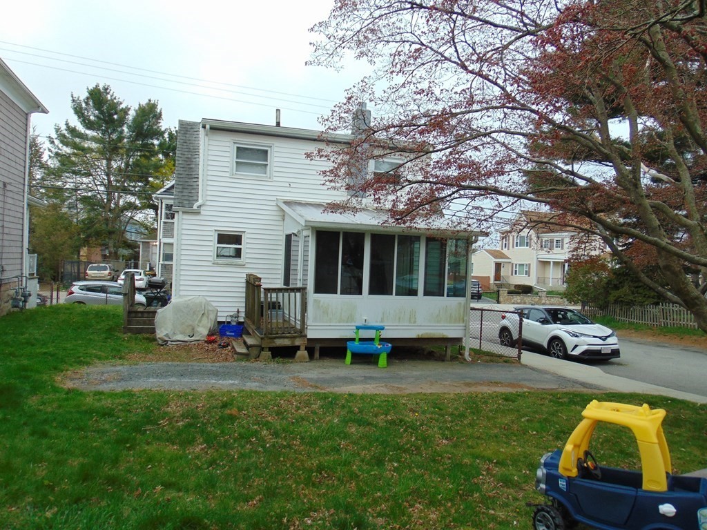 312 Anthony Fall River Fall River, MA 02721 - Photo 6 of 19 a view of a house with backyard