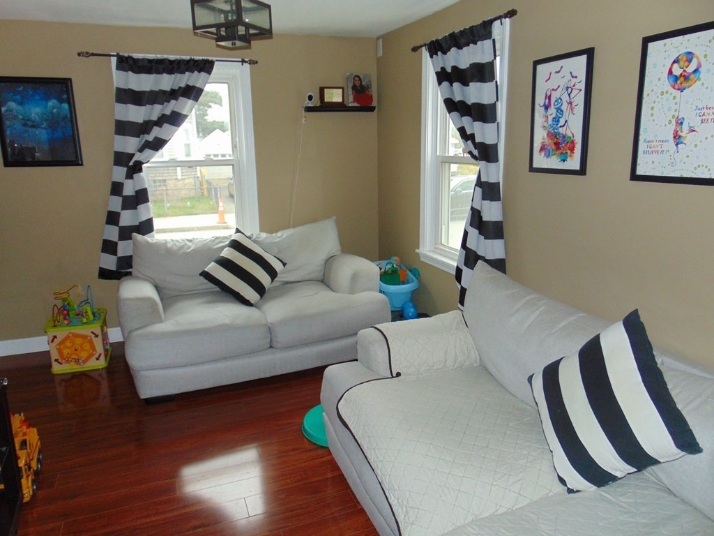312 Anthony Fall River Fall River, MA 02721 - Photo 9 of 19 a living room with furniture and wooden floor