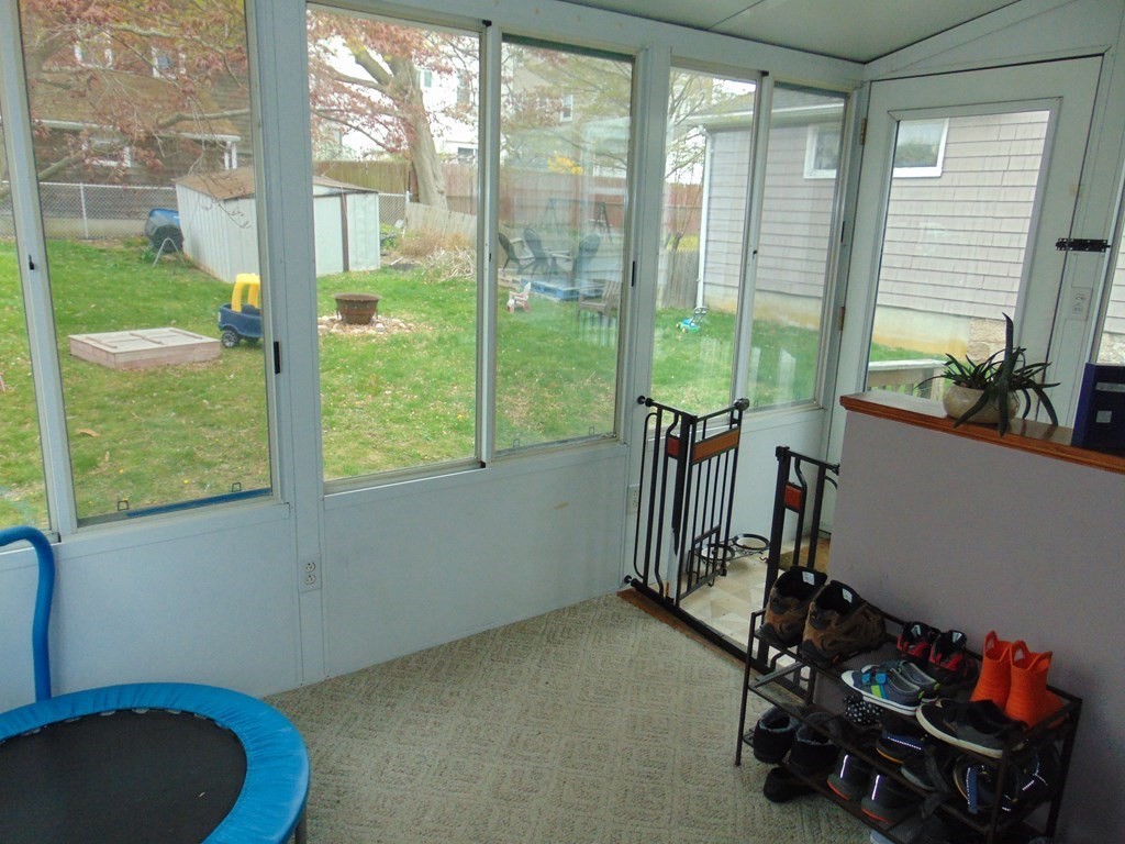 312 Anthony Fall River Fall River, MA 02721 - Photo 10 of 19 a room with gym equipment and a large window