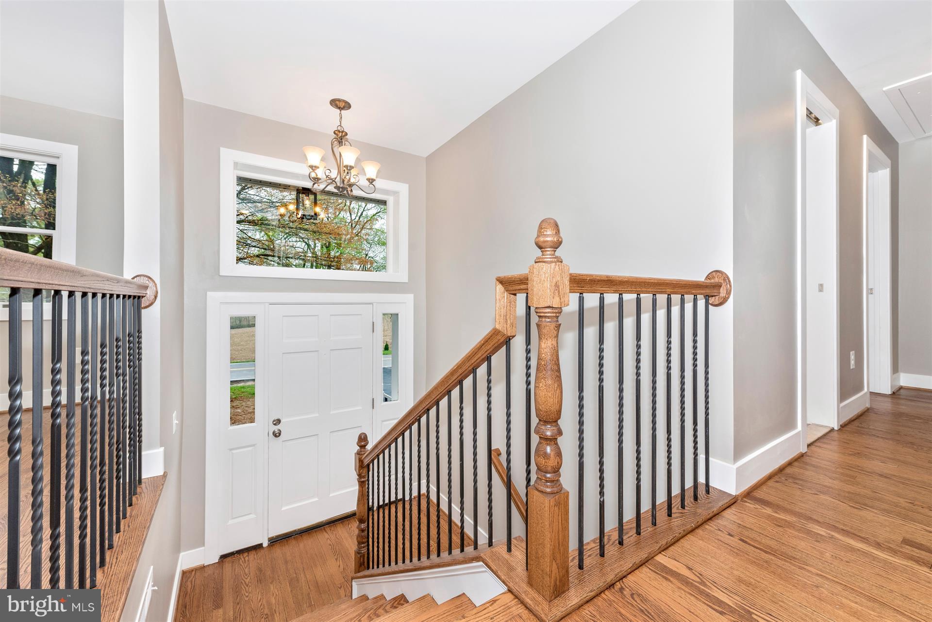 5008 Teen Barnes Road Frederick, MD 21703 - Photo 2 of 30 a view of a hallway with wooden floor and windows