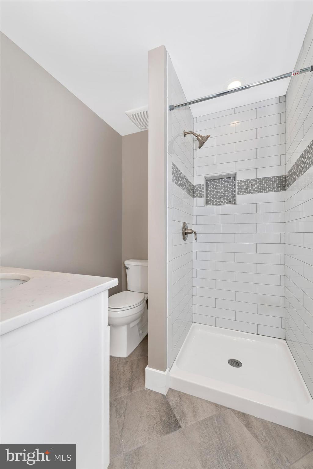 5008 Teen Barnes Road Frederick, MD 21703 - Photo 21 of 30 a bathroom with a shower a bath tub and a shower