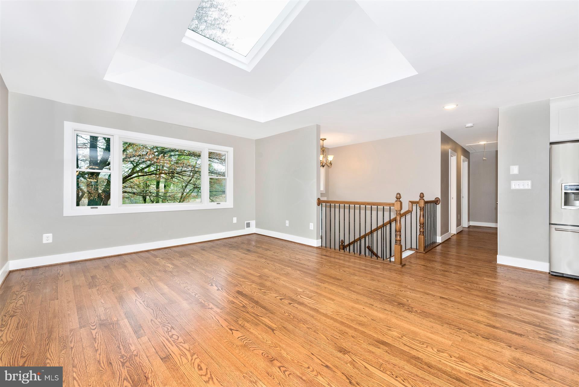 5008 Teen Barnes Road Frederick, MD 21703 - Photo 4 of 30 wooden floor in an empty room with a window