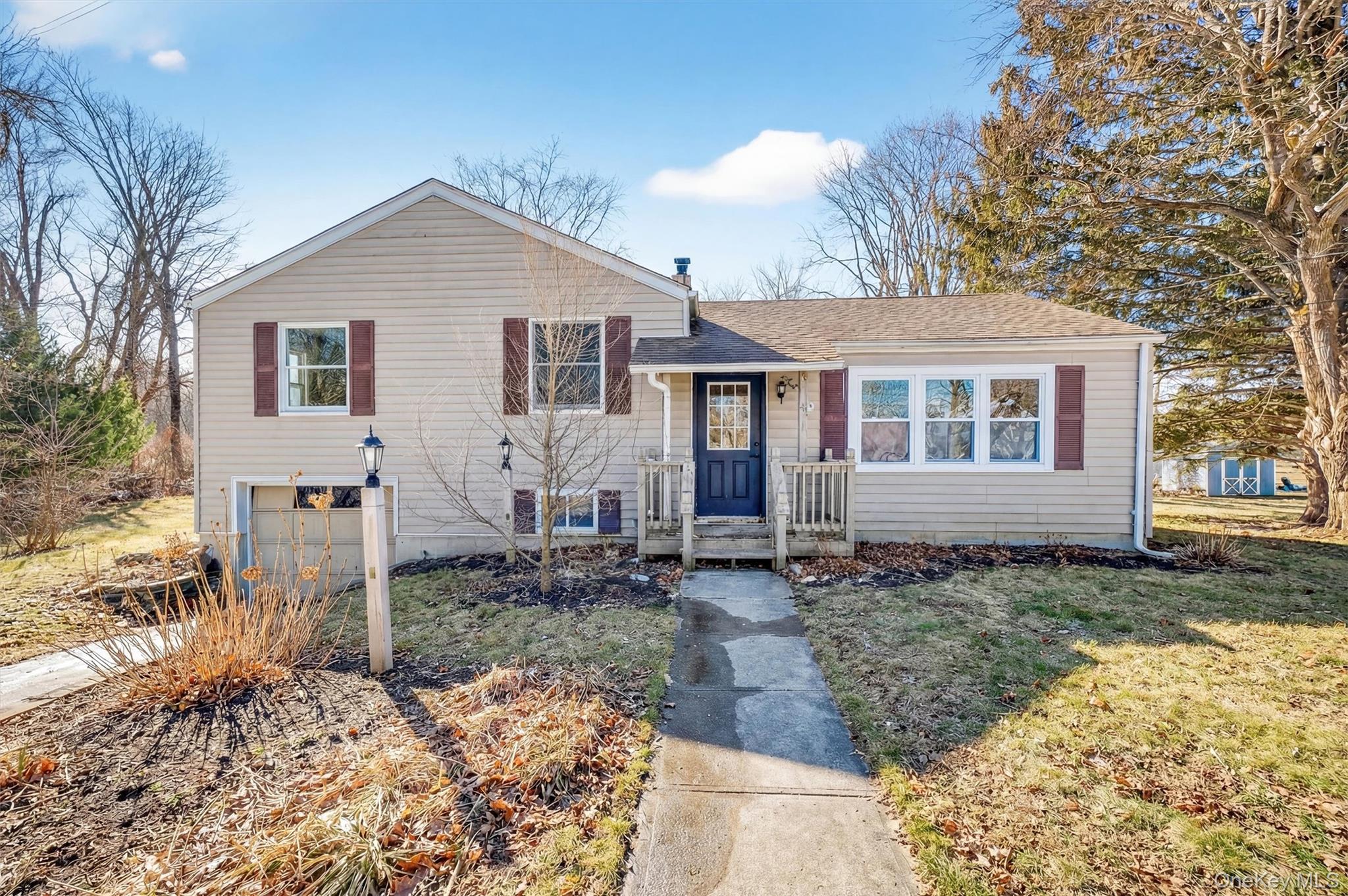 a view of a yard in front of a house with a yard