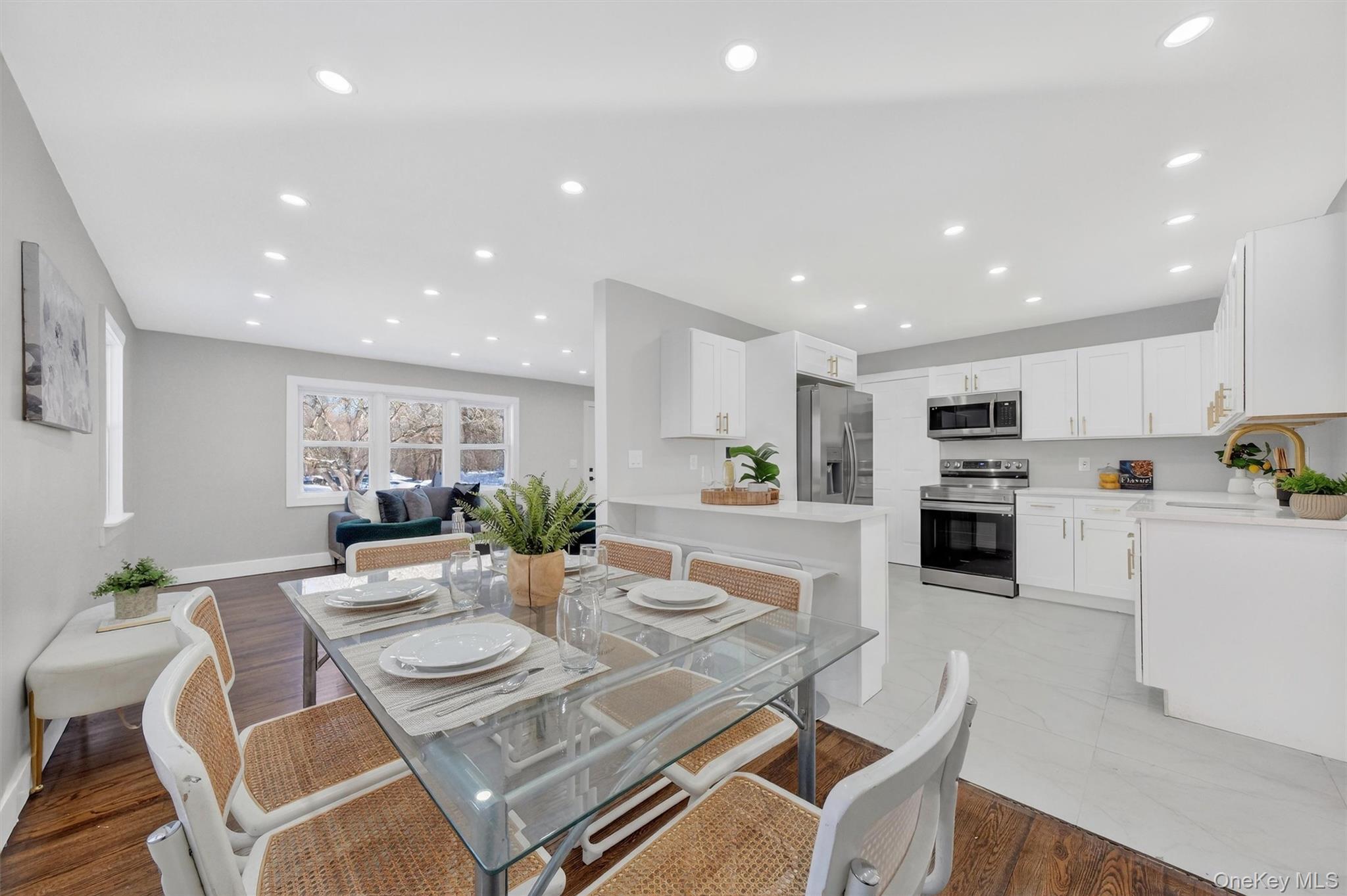 27 Franklin Road Hyde Park, NY 12538 - Photo 14 of 37 a view of kitchen with kitchen island stainless steel appliances refrigerator oven dining table and chairs