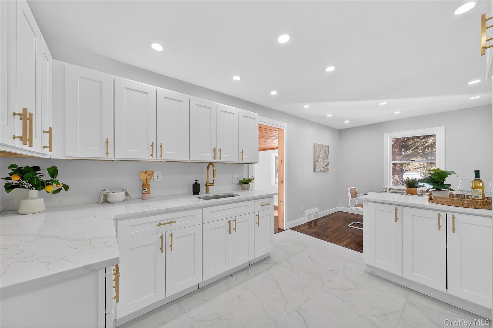 27 Franklin Road Hyde Park, NY 12538 - Photo 17 of 37 a kitchen with white cabinets and sink