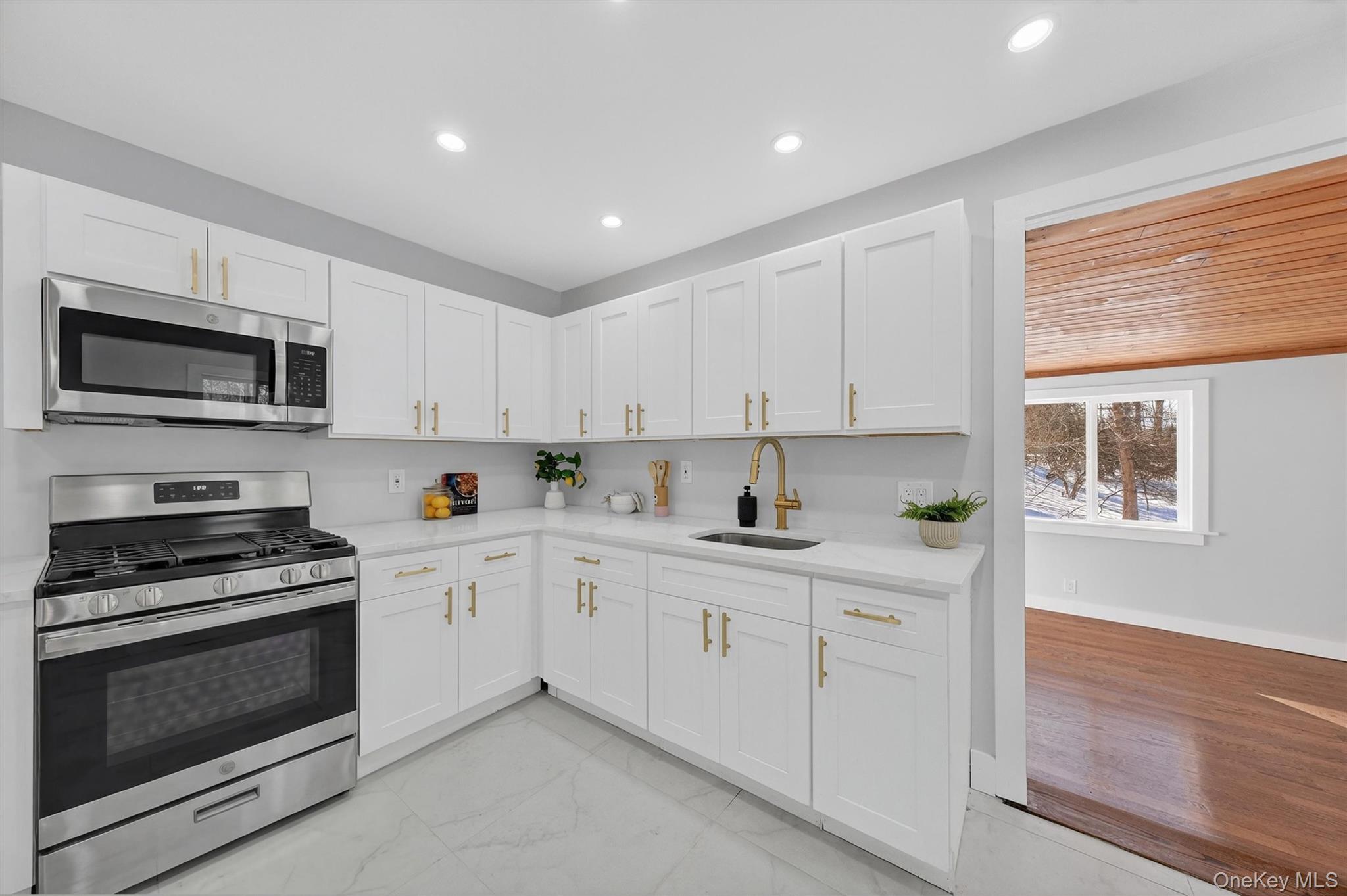 27 Franklin Road Hyde Park, NY 12538 - Photo 18 of 37 a kitchen with white cabinets stainless steel appliances and sink