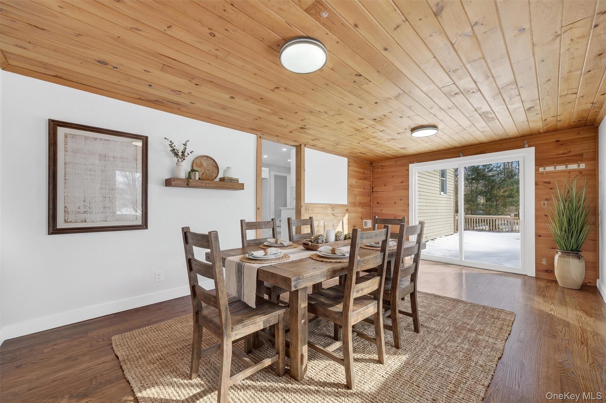 27 Franklin Road Hyde Park, NY 12538 - Photo 20 of 37 a view of a dining room with furniture wooden floor and chandelier