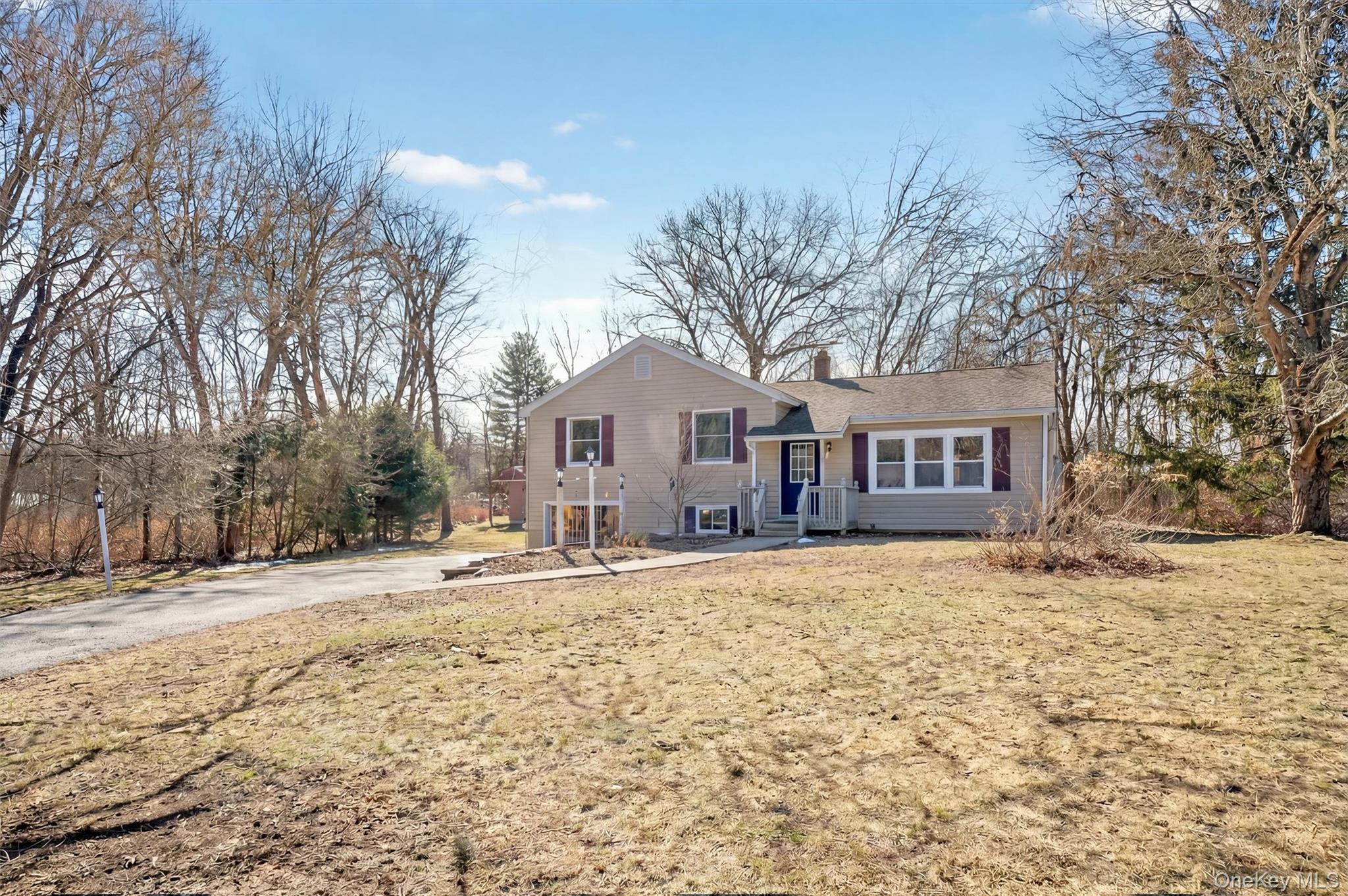 27 Franklin Road Hyde Park, NY 12538 - Photo 2 of 37 a front view of a house with a dirt yard and covered with snow