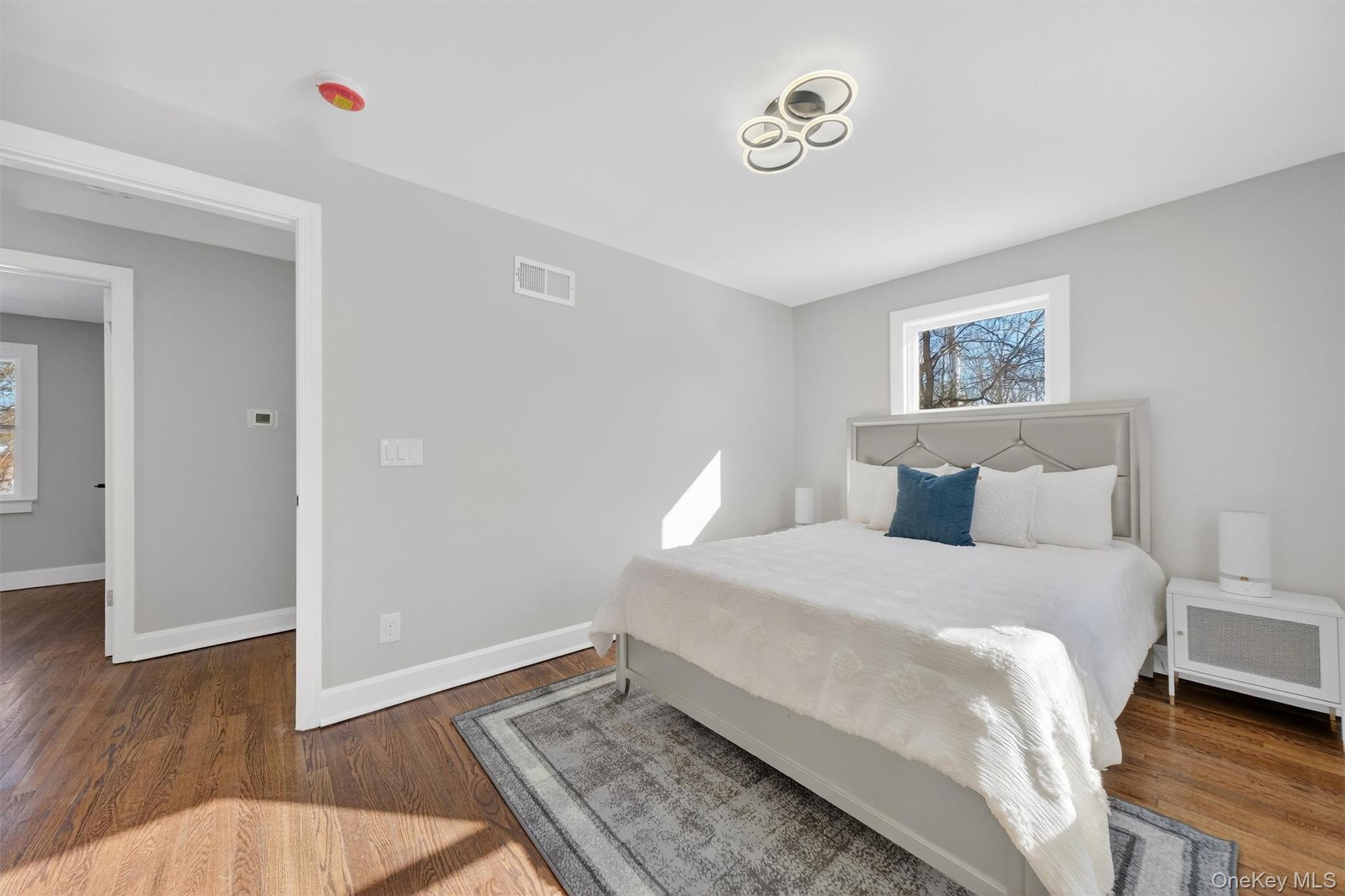 27 Franklin Road Hyde Park, NY 12538 - Photo 25 of 37 a bedroom with a bed and a wooden floor