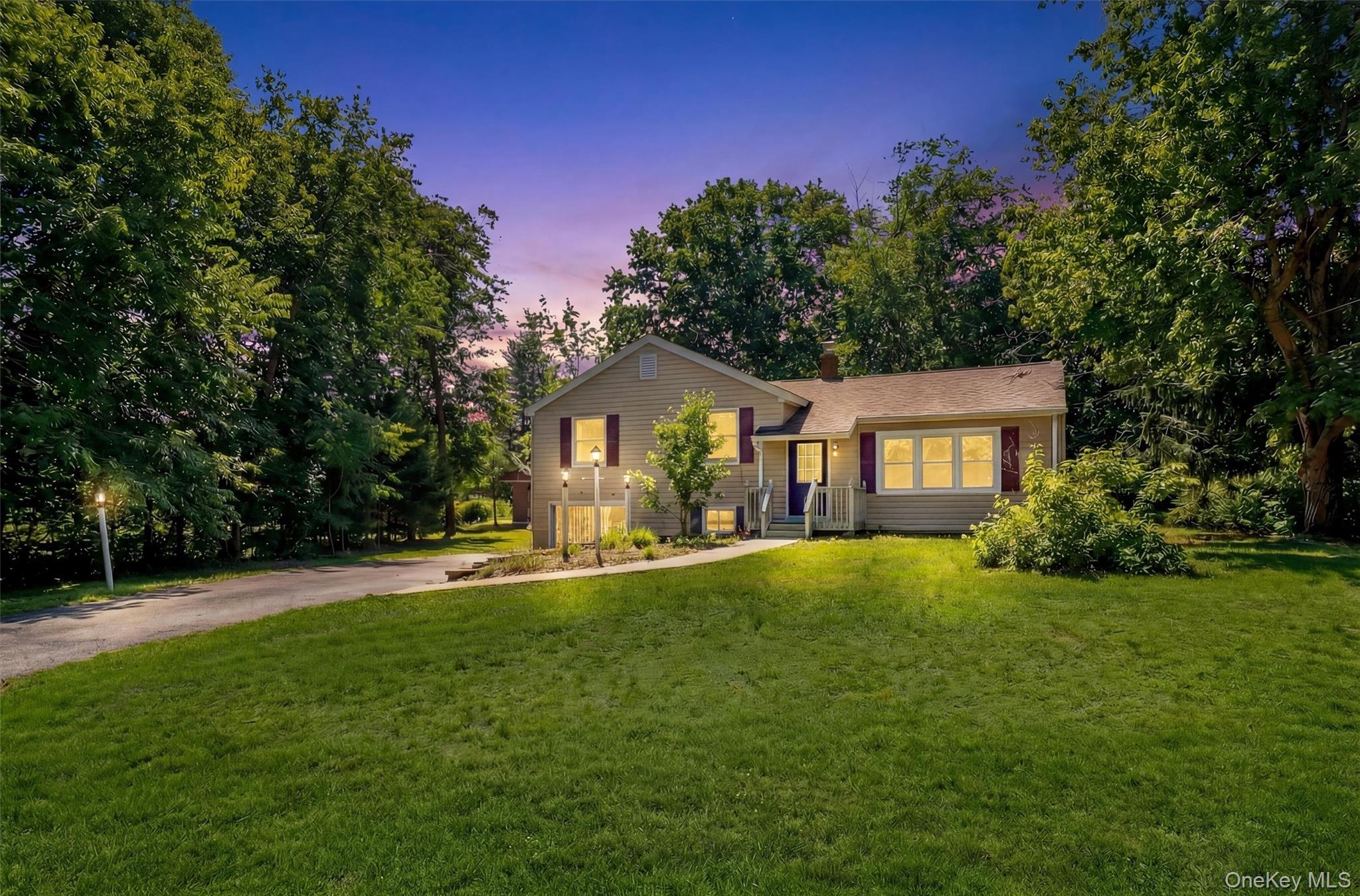 27 Franklin Road Hyde Park, NY 12538 - Photo 3 of 37 a front view of a house with yard and green space