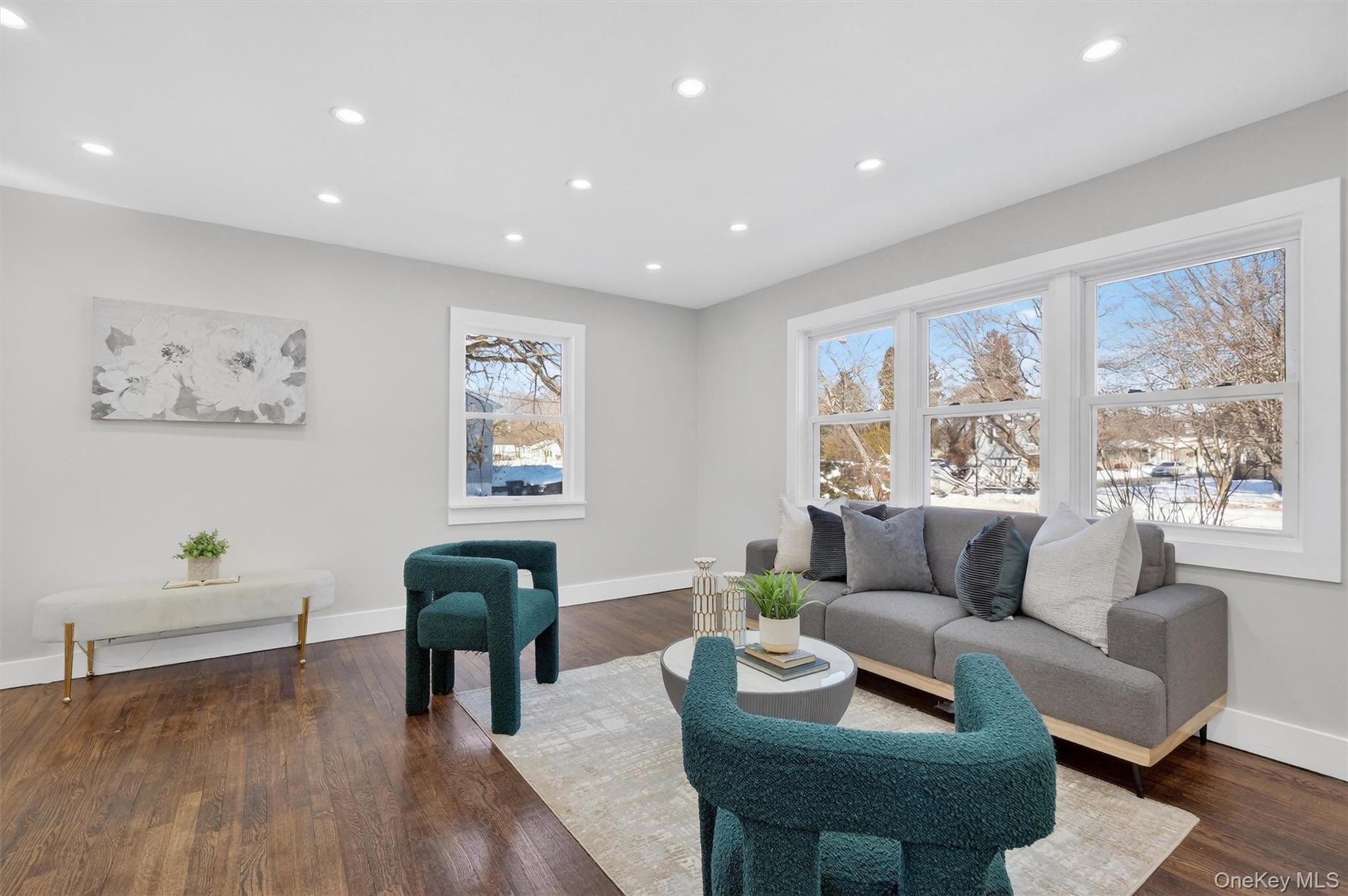 27 Franklin Road Hyde Park, NY 12538 - Photo 7 of 37 a living room with furniture and a large window
