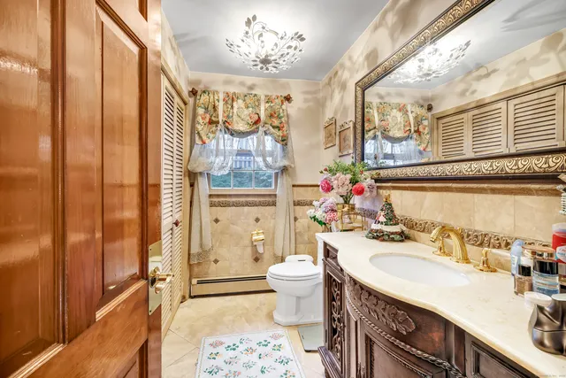 a bedroom with a bed and a table