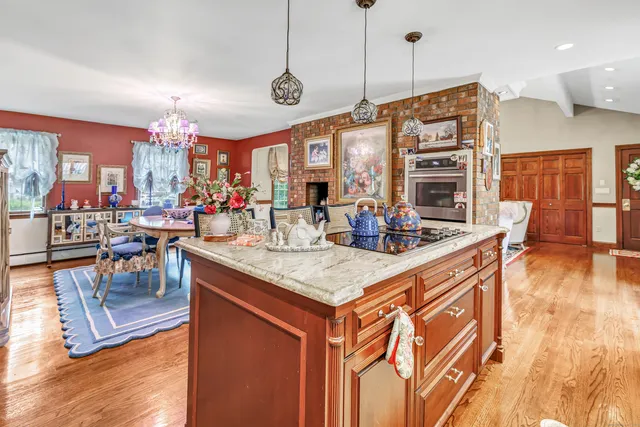 a view of a kitchen and dining room