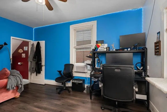 a workspace with furniture and screen