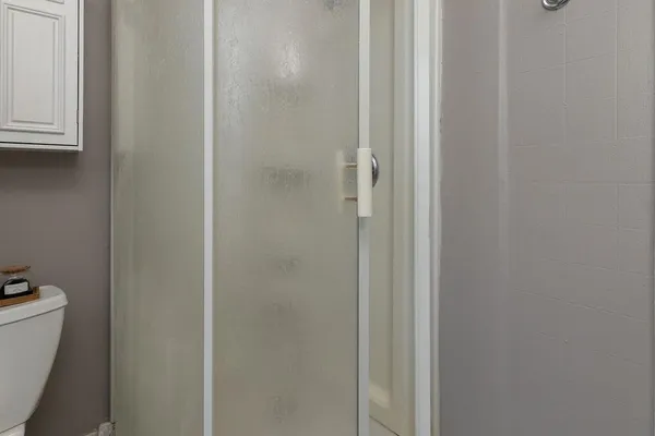 a bathroom with a toilet and a sink