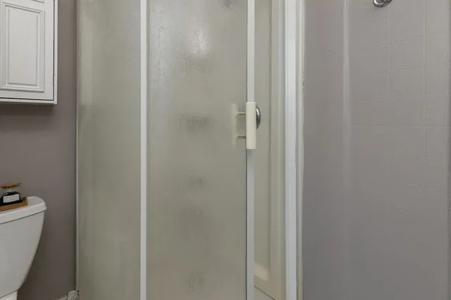 a bathroom with a toilet and a sink