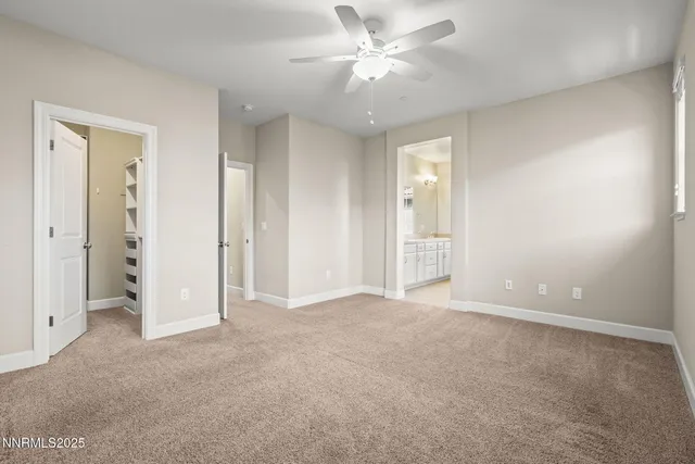 a bathroom with a sink double vanity and a shower