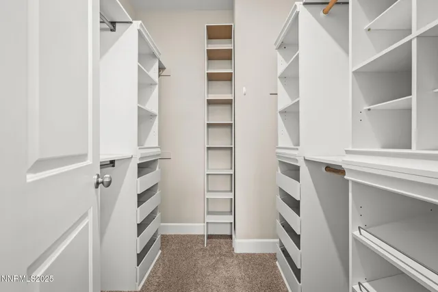 a bathroom with a shower sink and mirror