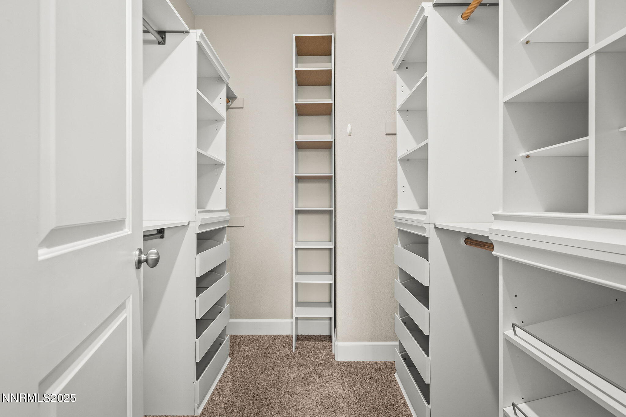 1875 Sea Horse Road, Unit C Reno, NV 89521 - Photo 19 of 39 a view of walk in closet with empty racks
