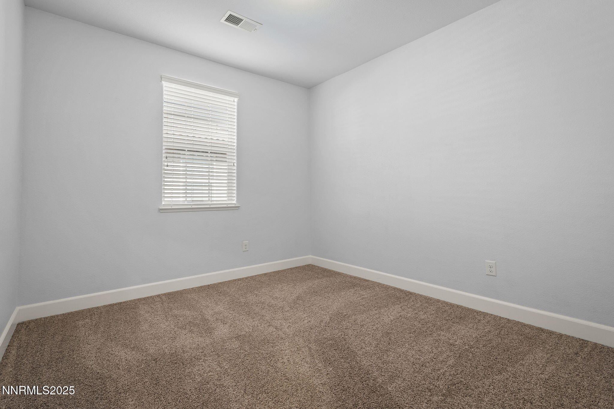 1875 Sea Horse Road, Unit C Reno, NV 89521 - Photo 22 of 39 an empty room with a window