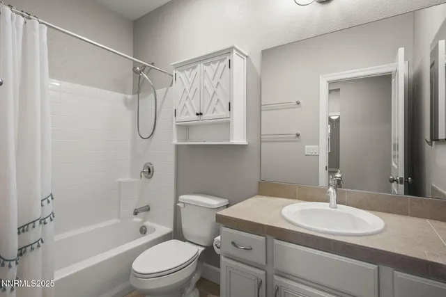 a view of a hallway with front door