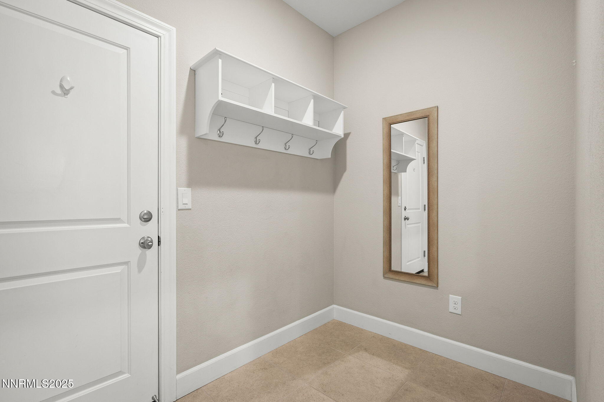 1875 Sea Horse Road, Unit C Reno, NV 89521 - Photo 27 of 39 a view of a hallway with front door