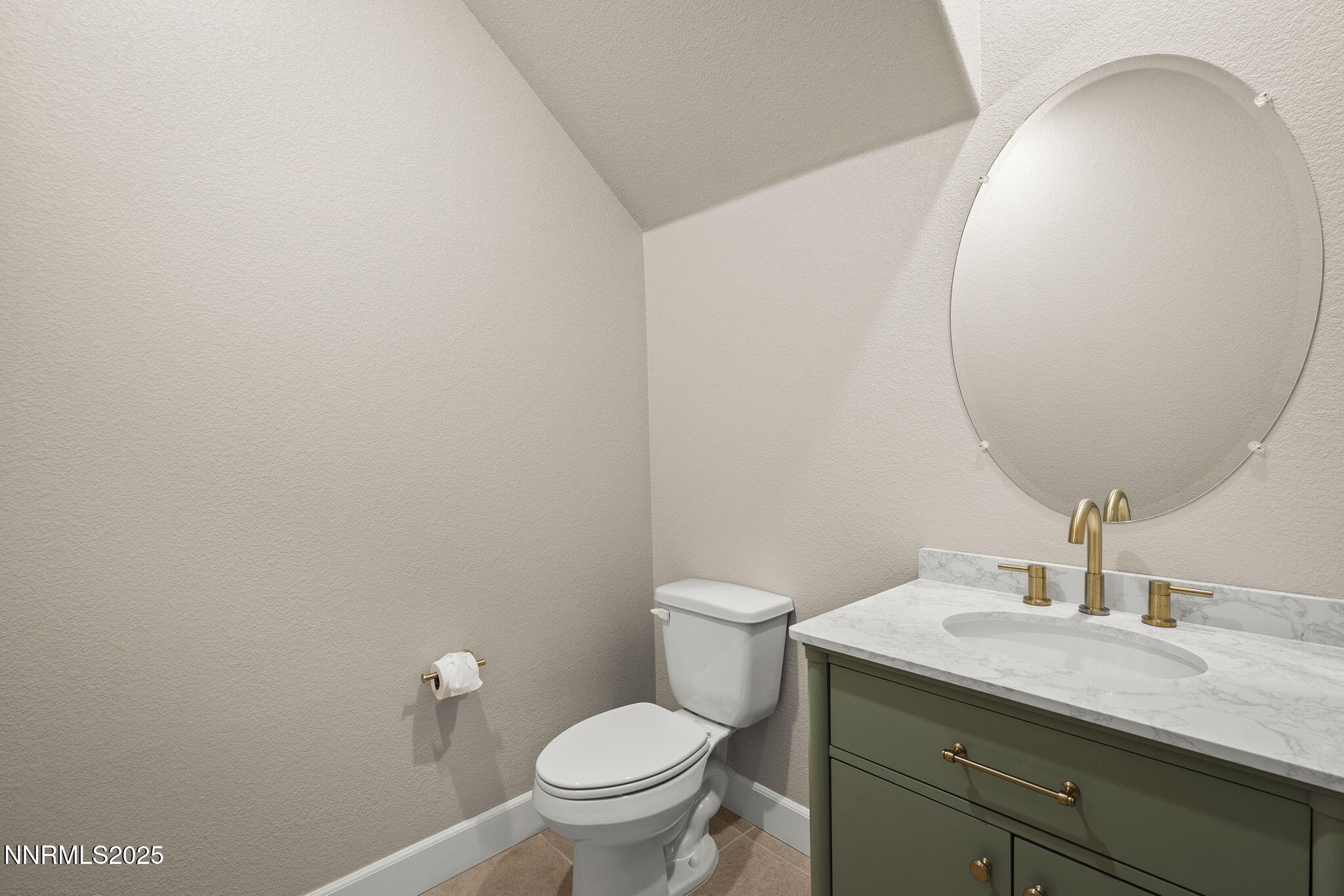1875 Sea Horse Road, Unit C Reno, NV 89521 - Photo 28 of 39 a bathroom with a granite countertop sink and a mirror