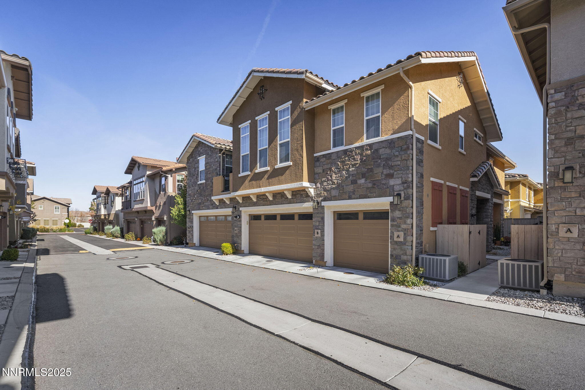 1875 Sea Horse Road, Unit C Reno, NV 89521 - Photo 34 of 39 a front view of a building with a street