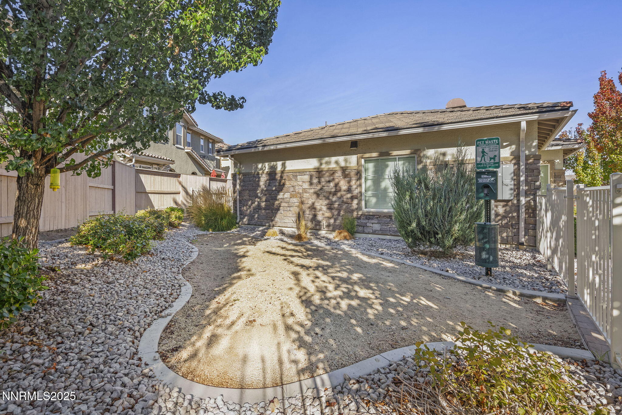 1875 Sea Horse Road, Unit C Reno, NV 89521 - Photo 37 of 39 a view of a house with a yard
