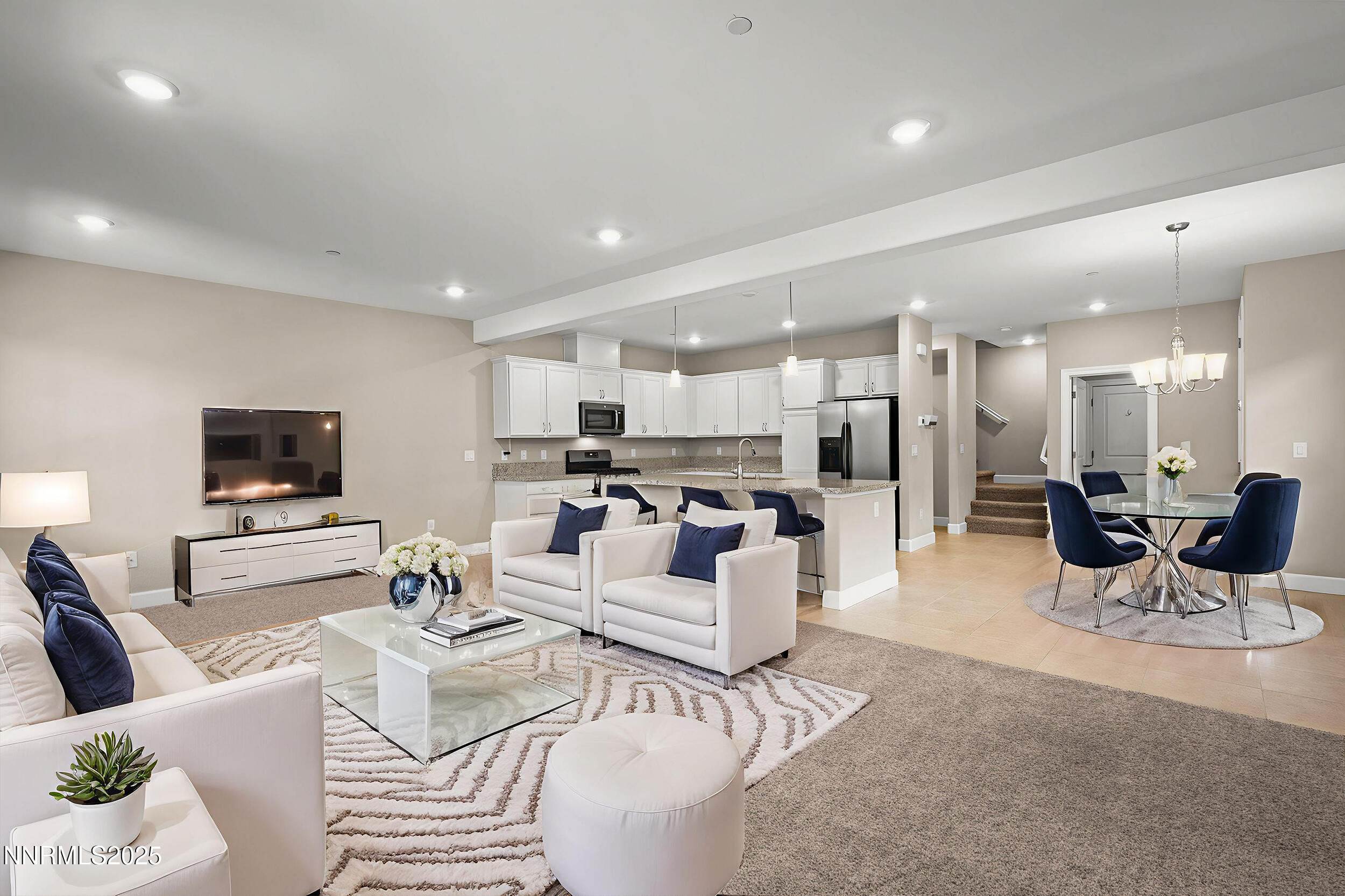 1875 Sea Horse Road, Unit C Reno, NV 89521 - Photo 5 of 39 a living room with furniture kitchen view and a flat screen tv
