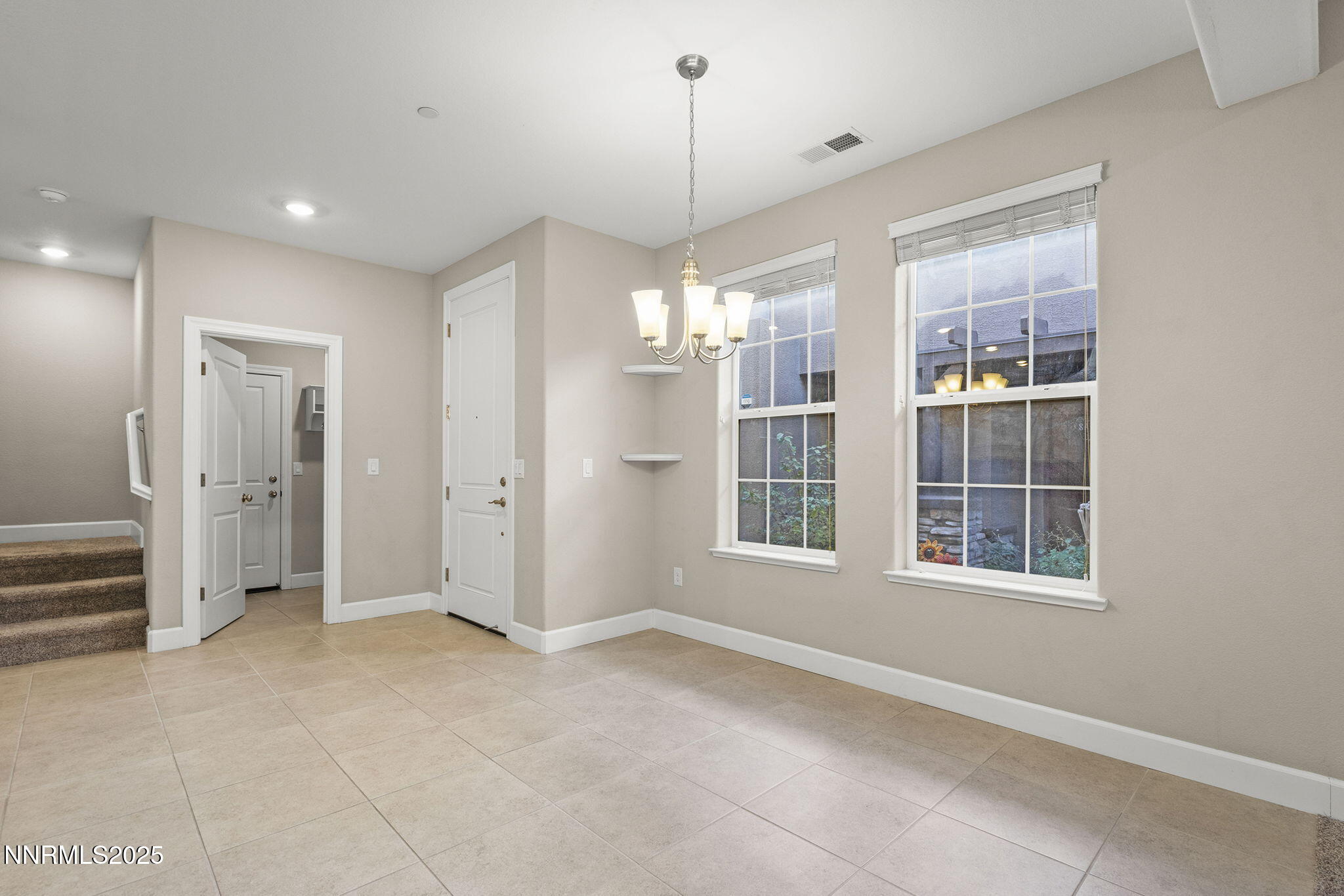 1875 Sea Horse Road, Unit C Reno, NV 89521 - Photo 9 of 39 a view of an empty room with a window