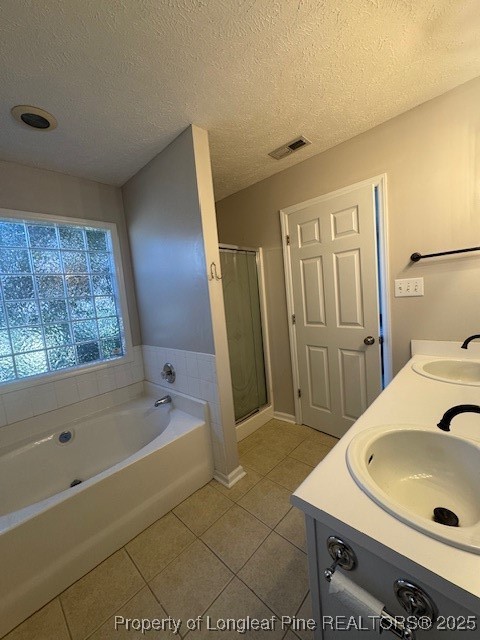 209 Dolphin Drive Raeford, NC 28376 - Photo 9 of 30 a bathroom with a sink a bathtub and a shower