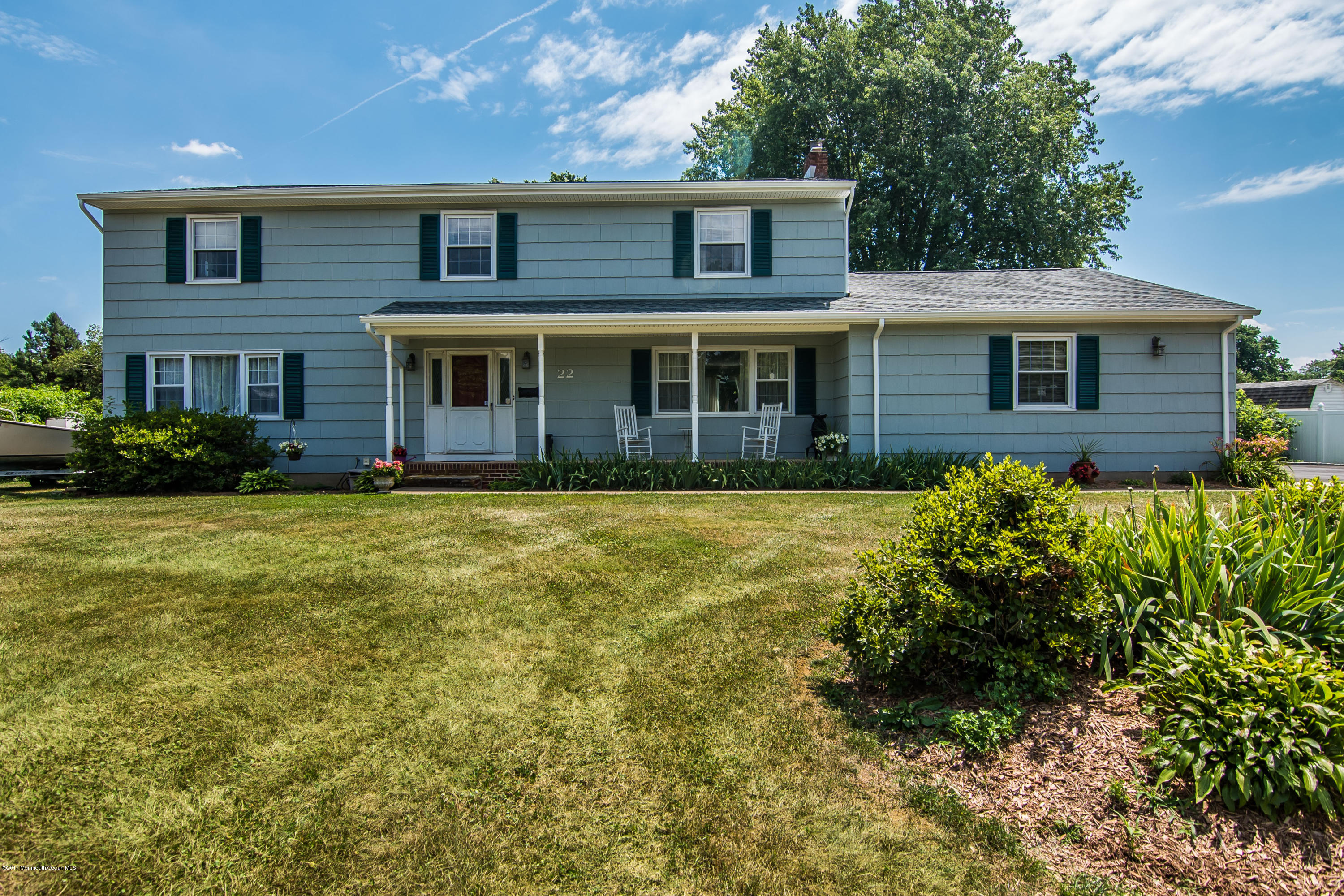 22 Old Post Road Freehold, NJ 07728 - Photo 1 of 61 a front view of a house with garden